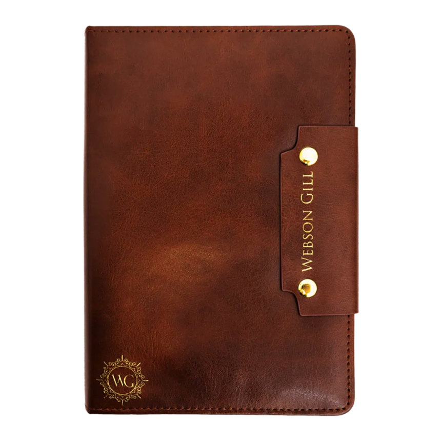 The Webson Gill Leather Writing Notebook features brown leather, gold accents, a strap closure engraved with the brand name, and premium fountain pen paper for a smooth writing experience.