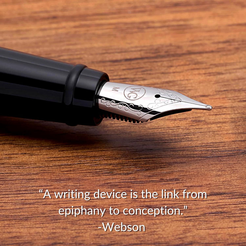 The WG 'Show Up' Everyday Fountain Pen with a stainless steel medium nib sits on a wooden surface, its tip ready to write a quote about writing attributed to Webson.