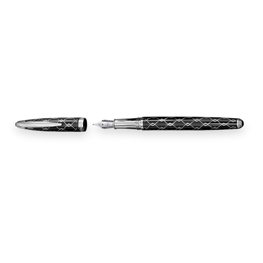 The WG ‘The Weaver’ Everyday Fountain Pen, featuring a silver lattice design, stainless steel medium nib, and matching cap, rests on a white background and promises a smooth writing experience.