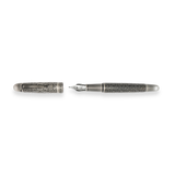 The Webson Gill Admiral Fountain Pen is a luxury writing instrument in antique silver, featuring ornate engravings and displayed with its cap removed.