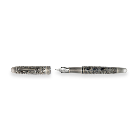 The Webson Gill Admiral Fountain Pen is a luxury writing instrument in antique silver, featuring ornate engravings and displayed with its cap removed.