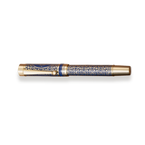The Regal Fountain Pen by Webson Gill is a gold and blue luxury pen featuring intricate patterns and gold brass filigree, displayed against a plain white background.