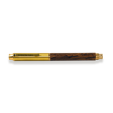 The Prestige Edition Fountain Pen by Webson Gill features a gold and wood brass body, an iridium nib, and "Webson Gill" engraved on the gold clip, shown against a white background.