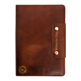 The Webson Gill Leather Writing Notebook features brown leather, gold accents, a strap closure engraved with the brand name, and premium fountain pen paper for a smooth writing experience.
