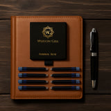 A Webson Gill blue ink refill starter pack (2 cartridges) and a fountain pen arranged neatly on a wooden surface.