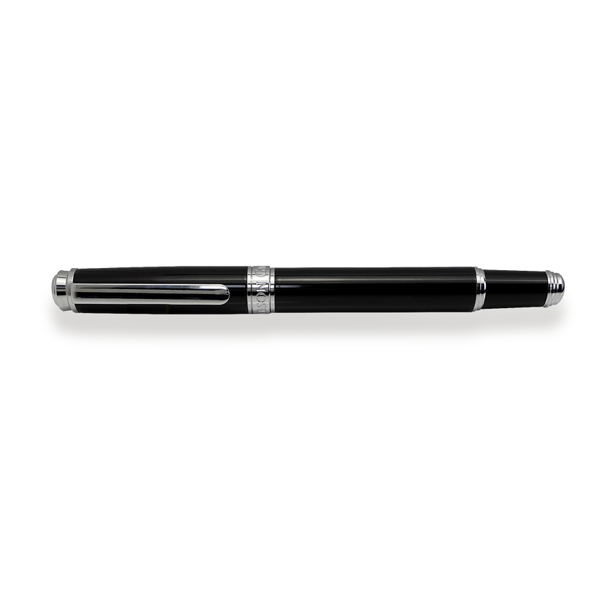 The Mogul Fountain Pen by Webson Gill features a black finish, stainless steel medium nib, and silver accents—an elegant gift for any occasion, shown resting on a white background.