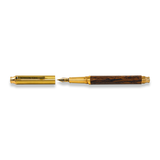 The Webson Gill Prestige Edition Fountain Pen, featuring gold and wood brass accents with an iridium nib and cap off, is displayed on a white background.