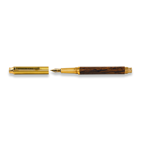 The Webson Gill Prestige Edition Fountain Pen, featuring gold and wood brass accents with an iridium nib and cap off, is displayed on a white background.