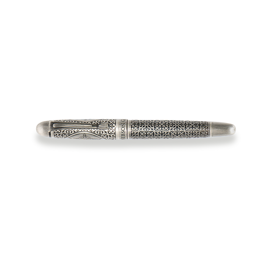 The Admiral Fountain Pen by Webson Gill is a luxury writing instrument with antique silver finish and ornate, engraved patterns on its barrel and cap.