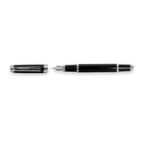 The Mogul Fountain Pen by Webson Gill features a glossy black resin finish with silver accents, shown uncapped and lying horizontally with the cap on the left; its stainless steel nib is visible.