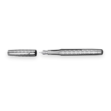 The WG ‘The Mirror’ Everyday Fountain Pen, a silver metal pen with a textured pattern and stainless steel nib, is shown with its cap beside it on a white background.