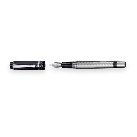 The WG ‘The Raider’ Everyday Fountain Pen, featuring a black and silver design with a textured barrel and stainless steel medium nib, rests beside its black cap on a white background.