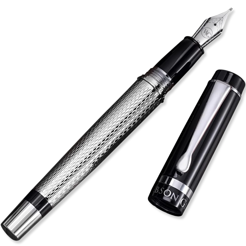 The WG ‘The Raider’ Everyday Fountain Pen features a silver and black textured barrel, stainless steel nib, and a detached cap—an elegant choice for any executive pen collection.