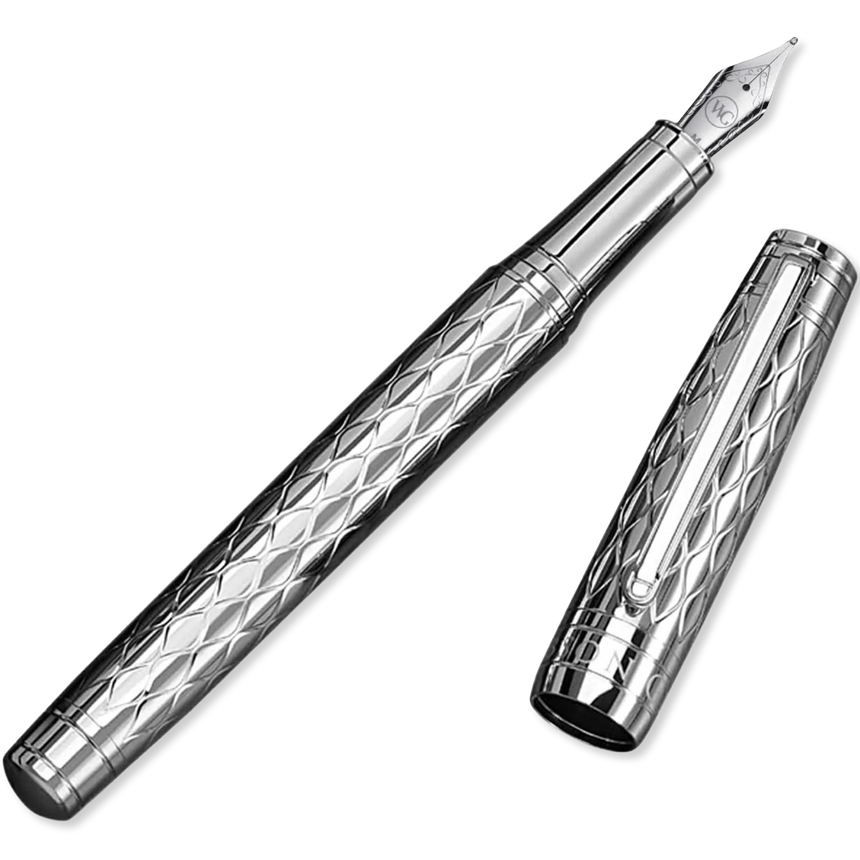 The WG ‘The Mirror’ Everyday Fountain Pen features a diamond-patterned silver barrel, matching cap, and a stainless steel nib for smooth writing.